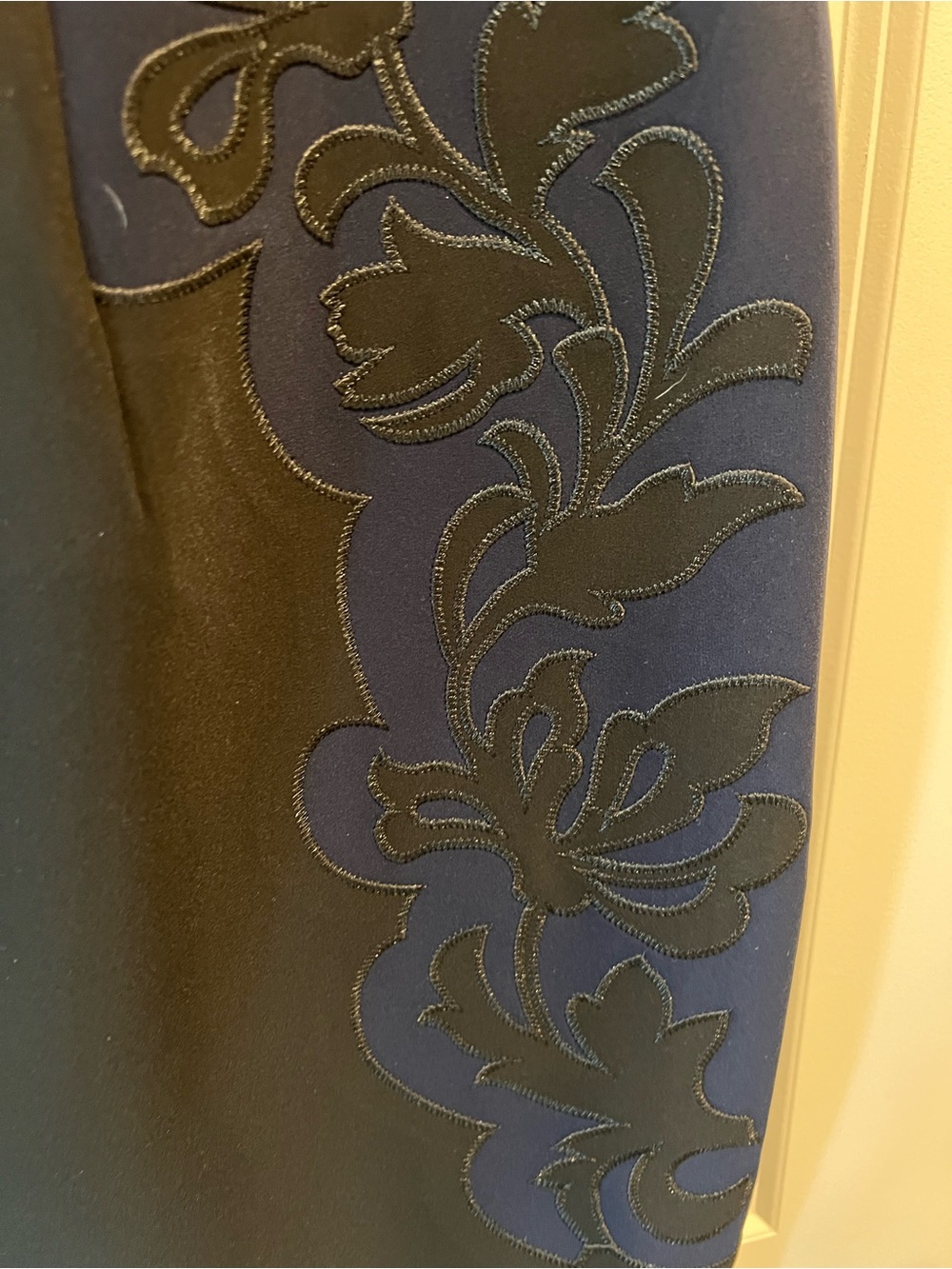 Womenβs Black Dress with Navy Inserts. And Black Floral Applique